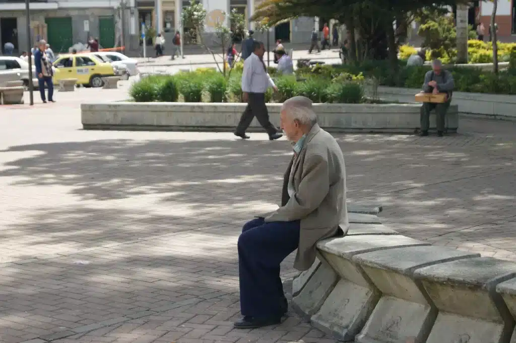 An old man sitting in the park