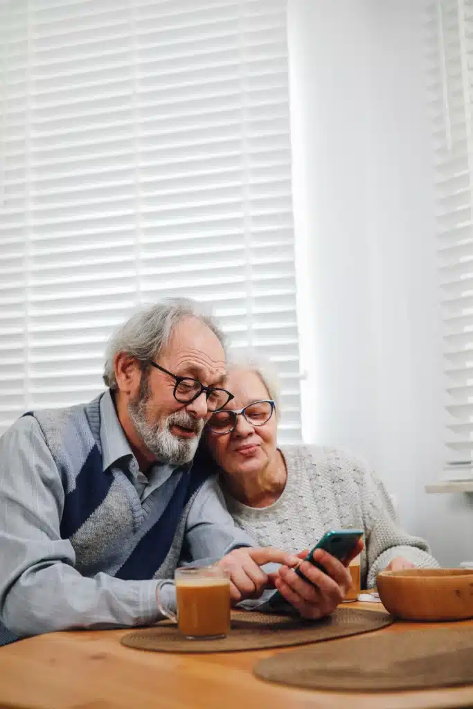 Elderly couple using a cellphone