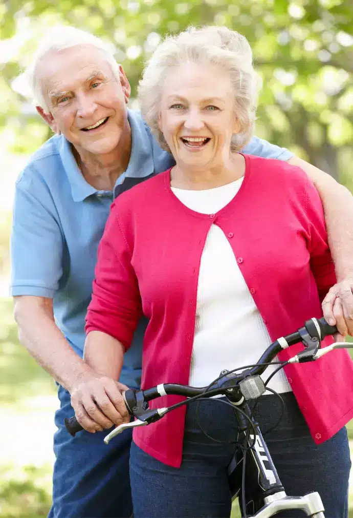 Senior couple cycling together