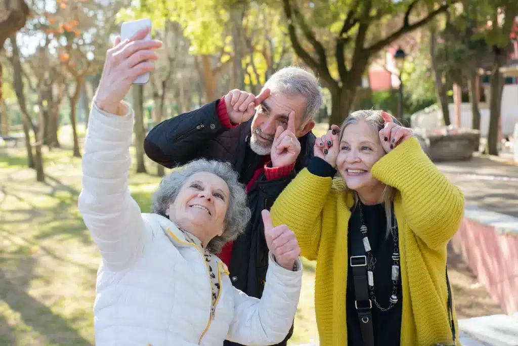 Three elderly friends having a group picture