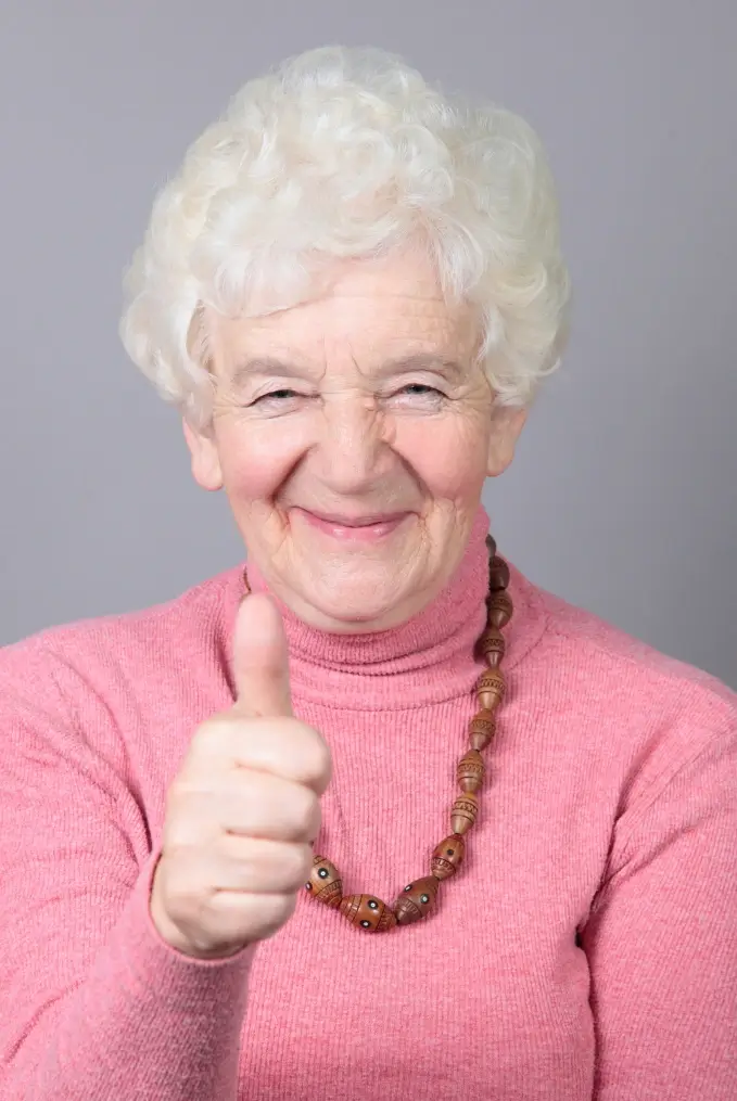 An-old-woman-doing-thumbs-up