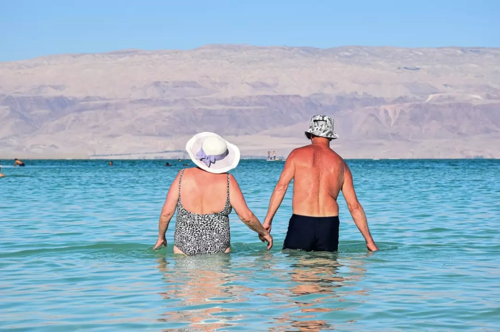 Senior couple having a beach vacation.